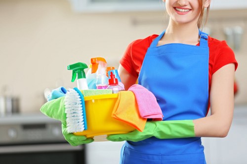 Technician using protective equipment during carpet cleaning