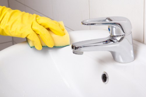 Local carpet cleaning service preparing a room for cleaning